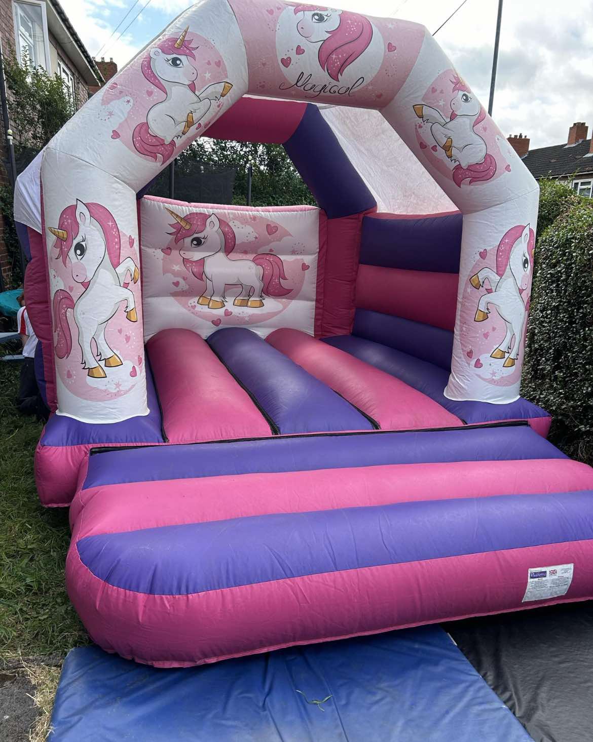 Enchanted Unicorn Dreamscape bouncy castle ready for children's party hire
